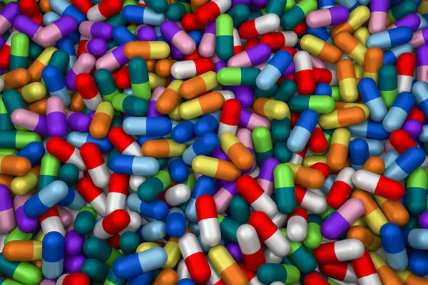 Una gran cantidad de cápsulas de colores — Foto de Stock