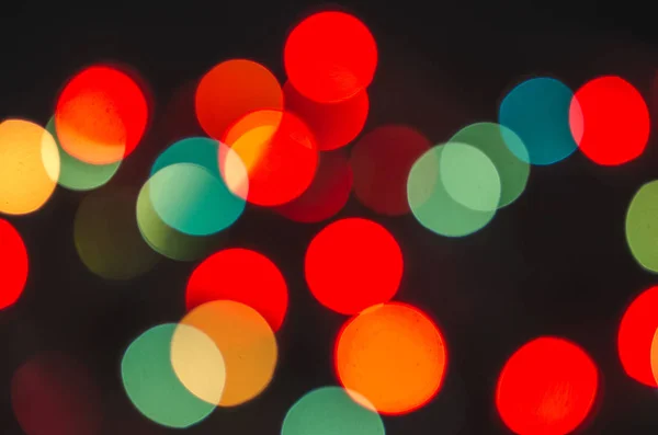 Barevné bokeh na černém pozadí — Stock fotografie