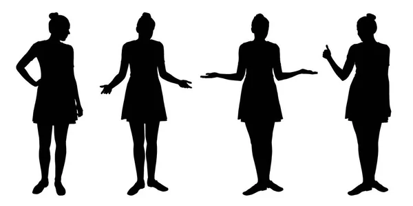 Set of realistic silhouettes of standing young women in different poses, isolated on white background - vector — Stock Vector