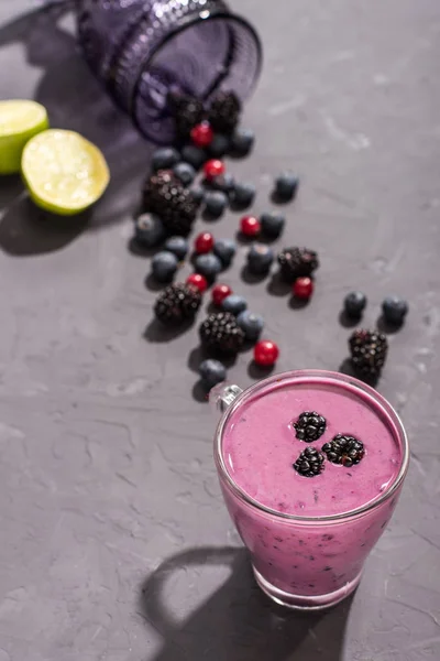 Berries smoothie in glass with blueberries — Stock Photo, Image