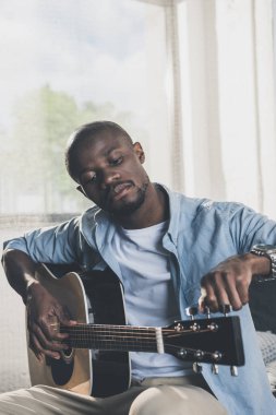 African american man with guitar clipart