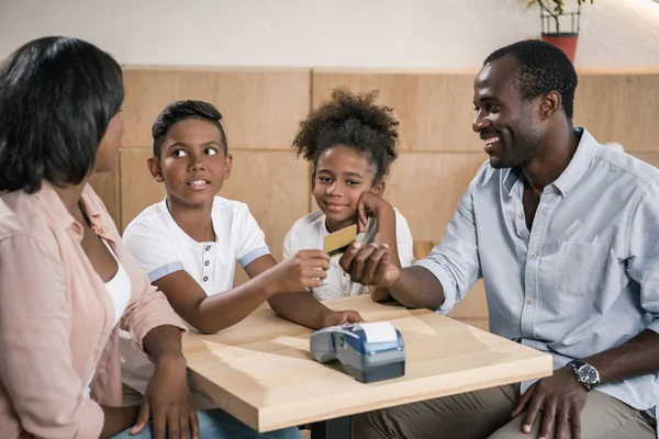 African-american family in cafe — Stock Photo, Image