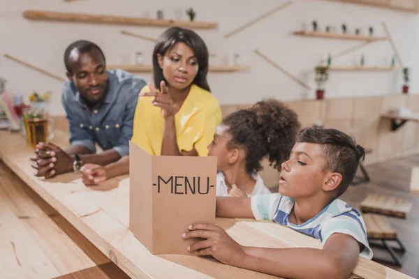 African-american family in cafe — Stock Photo, Image