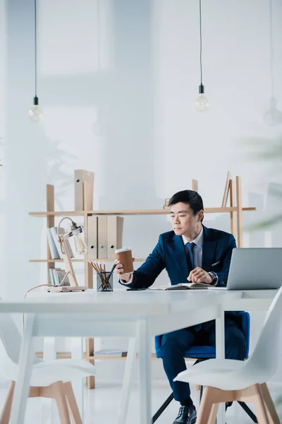 Thoughtful asian businessman — Stock Photo, Image