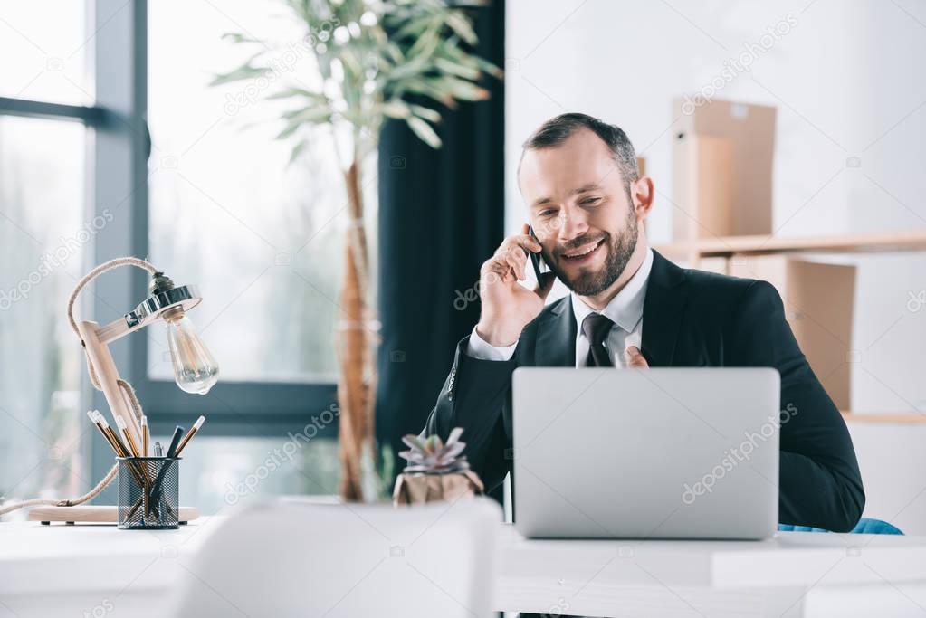 businessman talking by phone