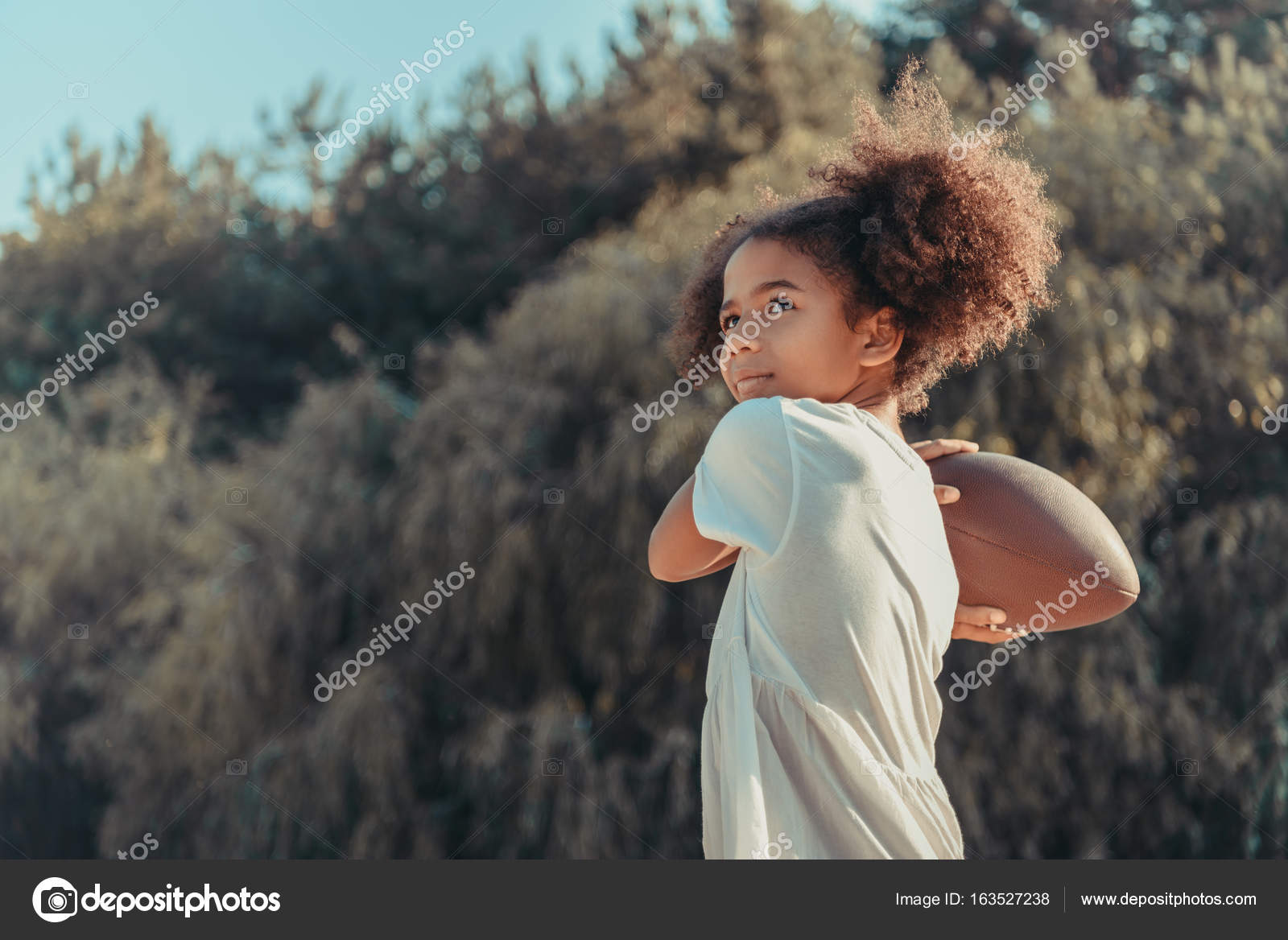 African american child with ball on beach — Stock Photo © AlexNazaruk