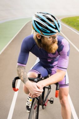 cyclist on cycle race track clipart