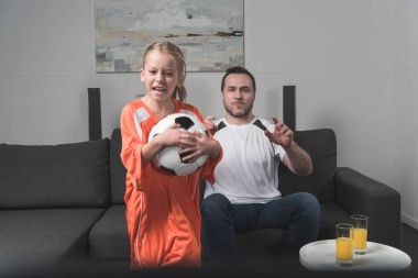 daughter and father disappointed of football game  clipart