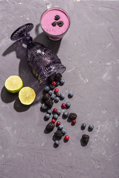 Berries smoothie in glass with blueberries — Stock Photo