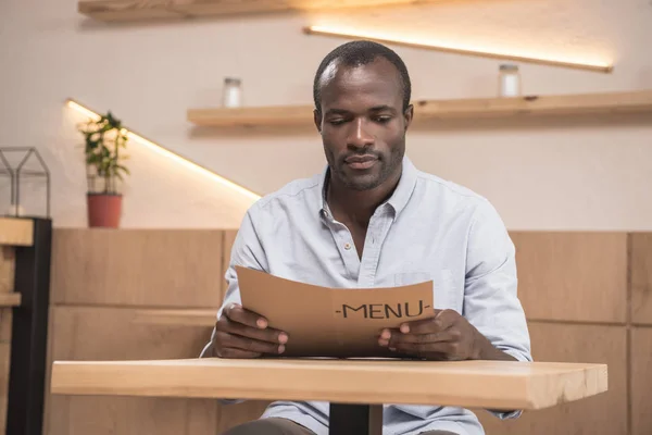 African-american man in cafe — Stock Photo