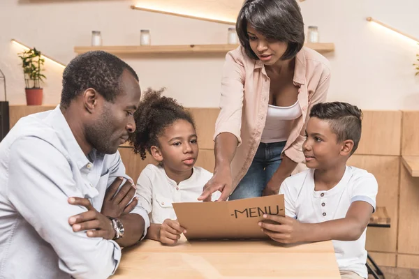 African-american family in cafe — Stock Photo