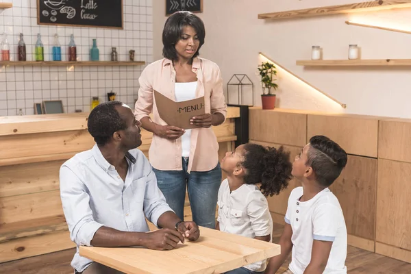 African-american family in cafe — Stock Photo