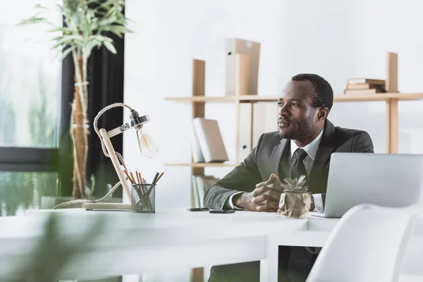 Thoughtful african-american businessman — Stock Photo