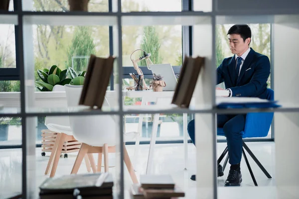 Serious young asian businessman — Stock Photo