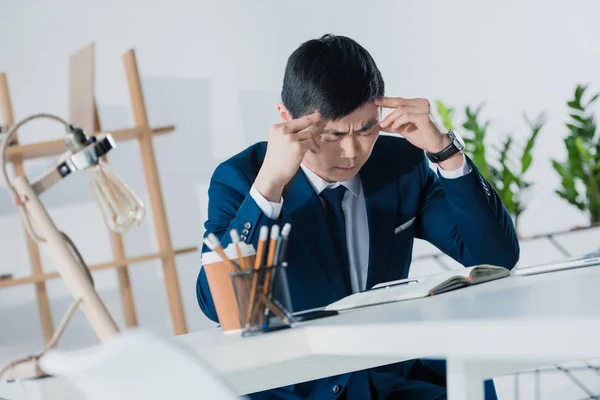 Thoughtful asian businessman — Stock Photo