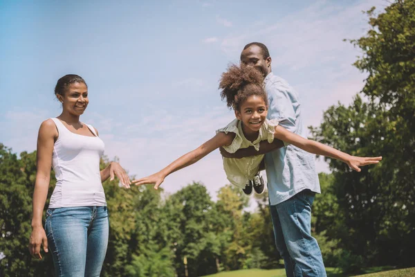African american family at countryside — Stock Photo