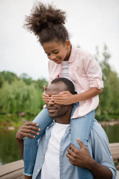 African american father and daughter in park — Stock Photo