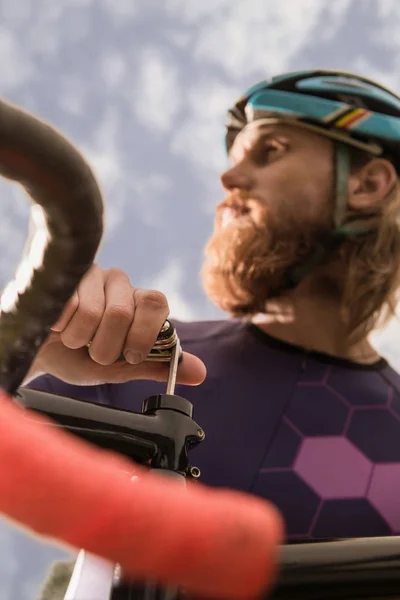 Young cyclist and bicycle — Stock Photo