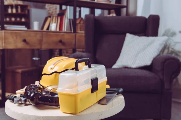 Plastic toy tools on table — Stock Photo