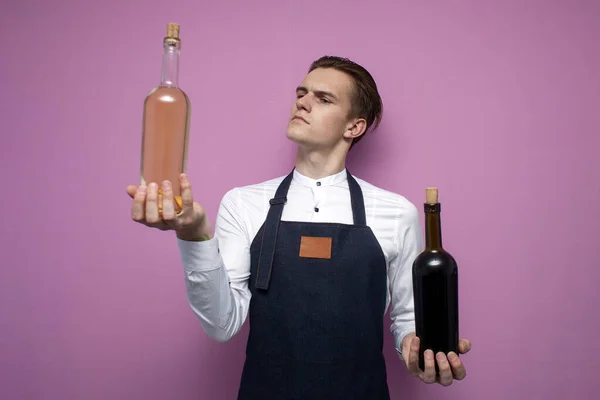 Young Professional Sommelier Uniform Holds Two Bottles Red White Wine — Stock Photo, Image