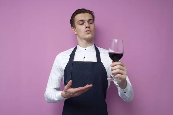 Young Sommelier Guy White Shirt Apron Holds Glass Red Wine — Stock Photo, Image