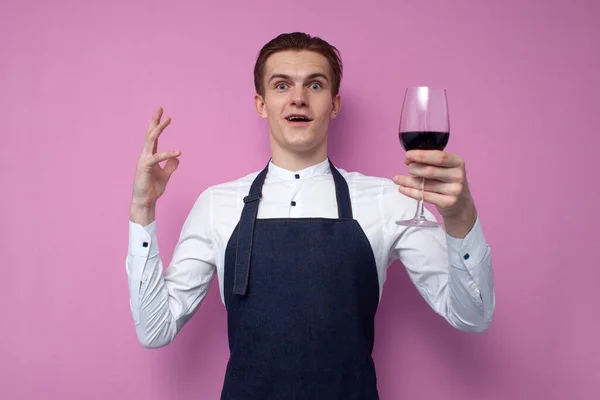 Young Professional Surprised Sommelier Uniform Holds Glass Red Wine Looks — Stock Photo, Image