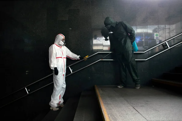 Two People Protective Suits Hazmat Disinfect Handrails Viruses Infections Disinfection — Stock Photo, Image