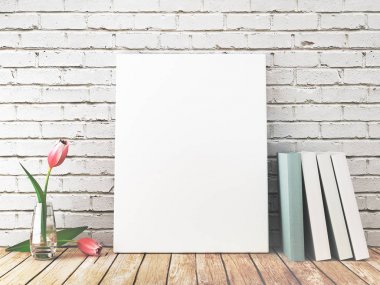 Tela bianca su mensola con fiori e libri