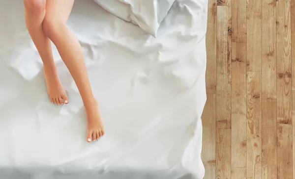 Woman legs on bed, 3d render illustration