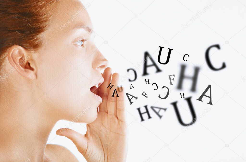 Woman talking with alphabet letters coming out of her mouth. White background