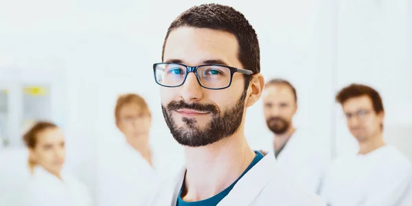 Healthcare, profession, people and medicine concept - smiling male doctor — Stock Photo, Image