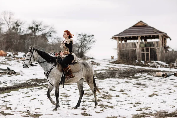 Viking girl on horseback — Stock Photo, Image