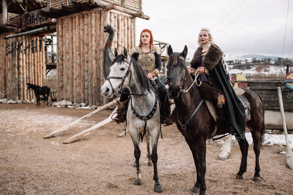 Girls Vikings on horseback