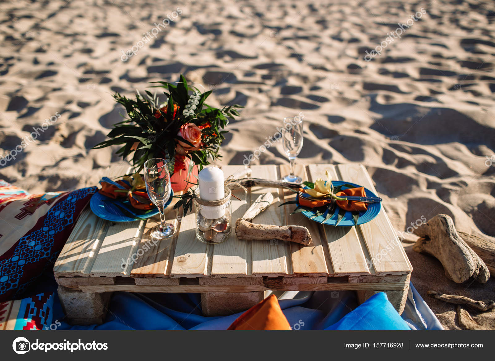 Romantic dinner, candles at ocean beach. Honeymoon, proposal or wedding background concept
