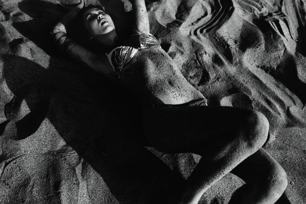 Sexy girl of Asian appearance in her swimsuit on the sea with sand, fashion — Stock Photo, Image