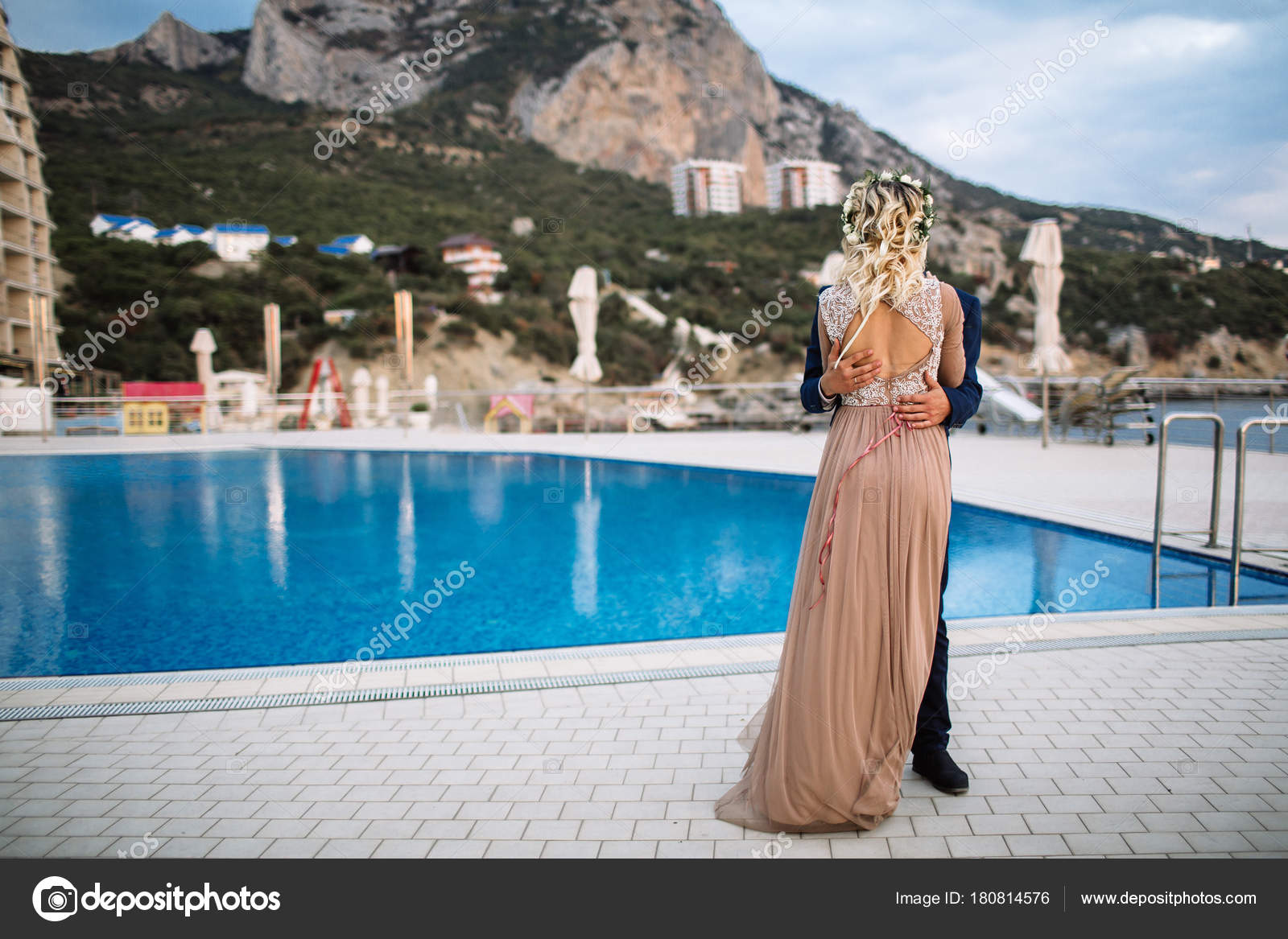 Bride And Groom At The Reception Pool Side After Their Wedding