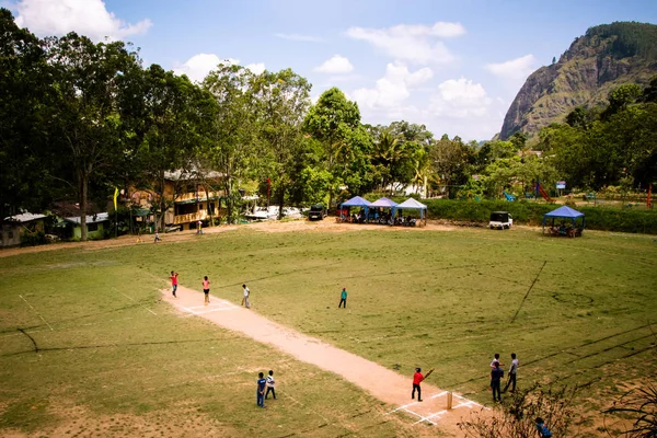 Children play cricket at the local grounds in Ella, Sri Lanka. T