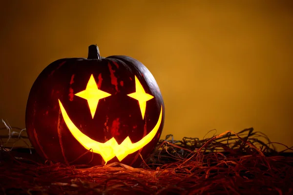 Abóbora de Halloween em uma forma de brincalhão Imagens De Bancos De Imagens Sem Royalties