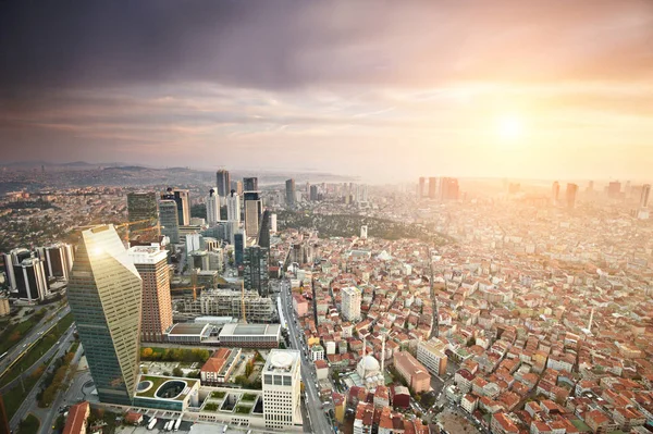 Aerial view of the Istanbul city downtown with skyscrapers at sunset