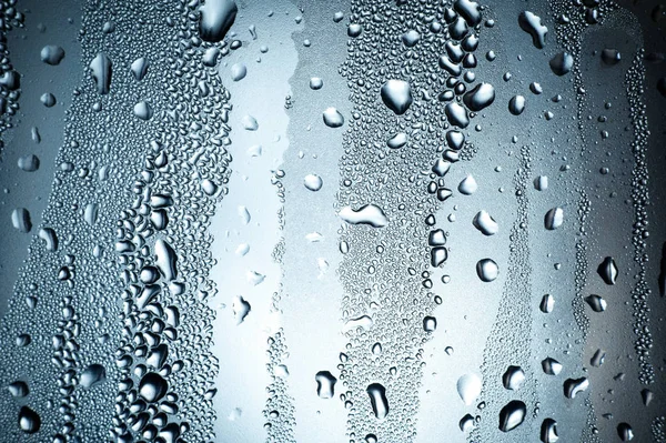 Gotas de agua sobre vidrio — Foto de Stock