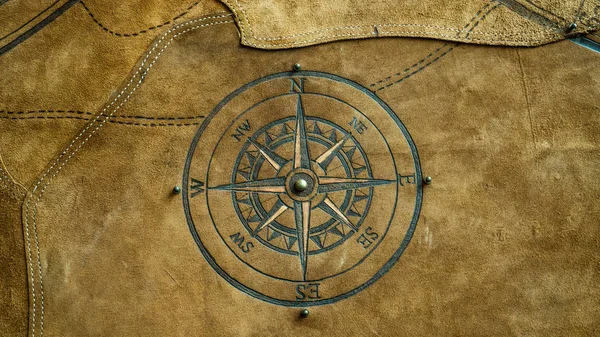The symbol of the compass on the animal skin is ancient and has value.