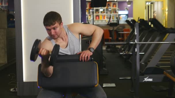 Athlete is Lifting Dumbbell — Stock Video