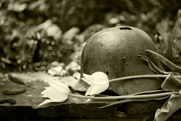 German old military helmet of the Second World War with white tu — Stock Photo, Image