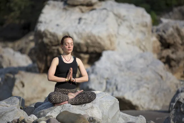 Amazing beautiful young woman does yoga. — Stock Photo, Image