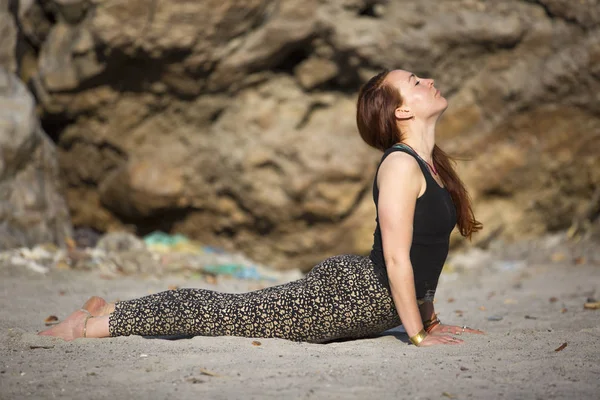 Amazing beautiful young woman does yoga. — Stock Photo, Image