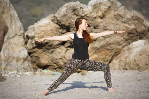 Amazing beautiful young woman does yoga. — Stock Photo, Image