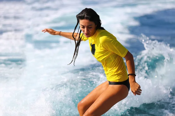 Young girl surfing on the waves. — Stock Photo, Image