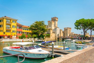 August, 06, 2019- Sirmione, Italy: View of the medieval castle Scaliger on lake Garda