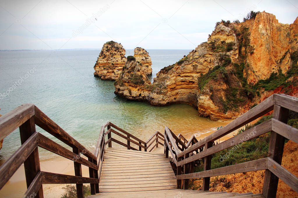 A wooden staircase in the azure sea. Evora. Portugal - beautiful