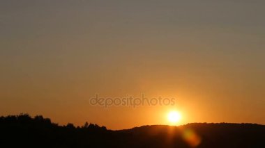 Timelapse günbatımı üzerinde temiz kırmızı sky